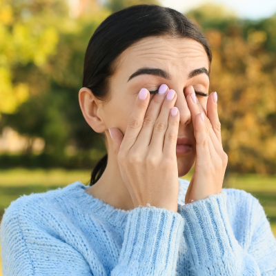 tulsa allergy season woman rubbing eyes due to tulsa oklahoma allergy season